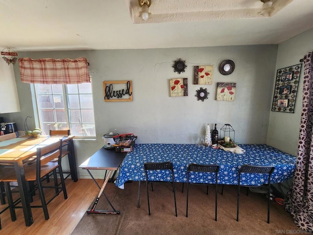 dining area featuring hardwood / wood-style flooring