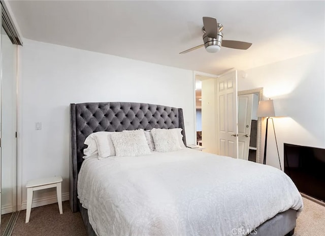 bedroom featuring a closet, ceiling fan, and carpet