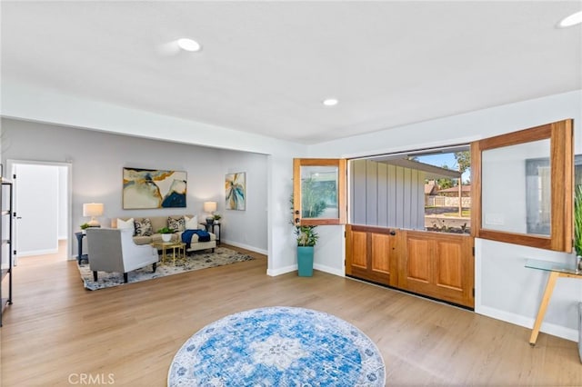 sitting room featuring light wood-type flooring