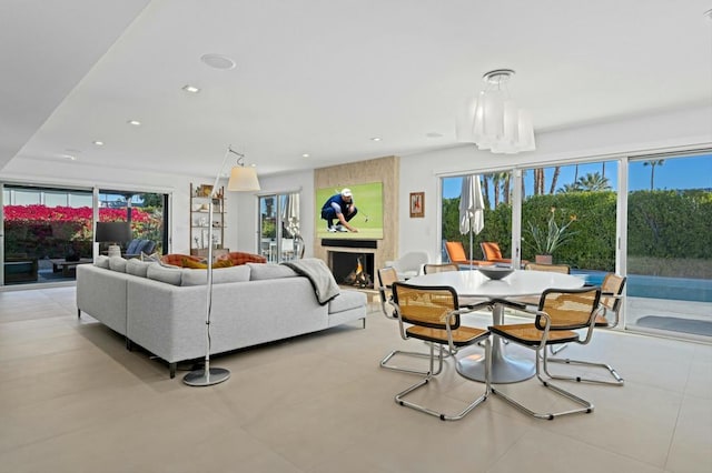 living room with a wealth of natural light and a fireplace