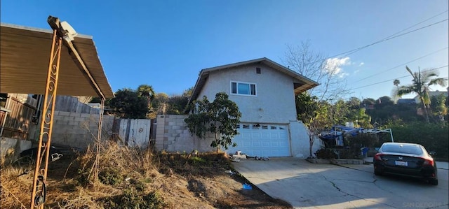 view of home's exterior featuring a garage