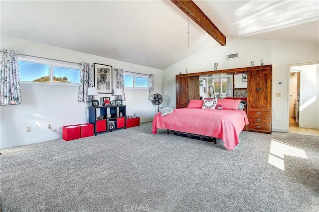 carpeted bedroom with vaulted ceiling with beams