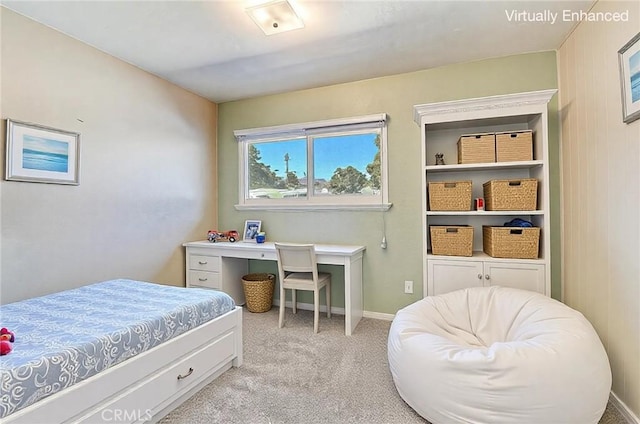 bedroom featuring light colored carpet