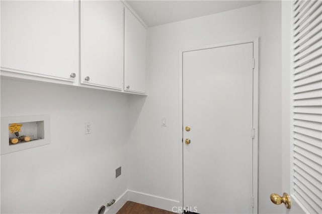 washroom featuring cabinet space, dark wood-style floors, hookup for a washing machine, and baseboards