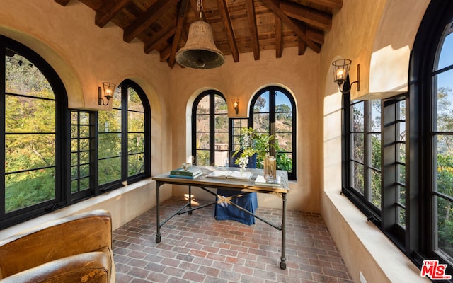 office featuring wooden ceiling and lofted ceiling with beams