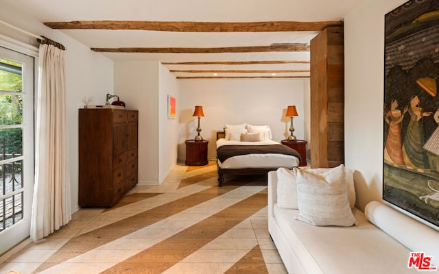 tiled bedroom featuring beamed ceiling