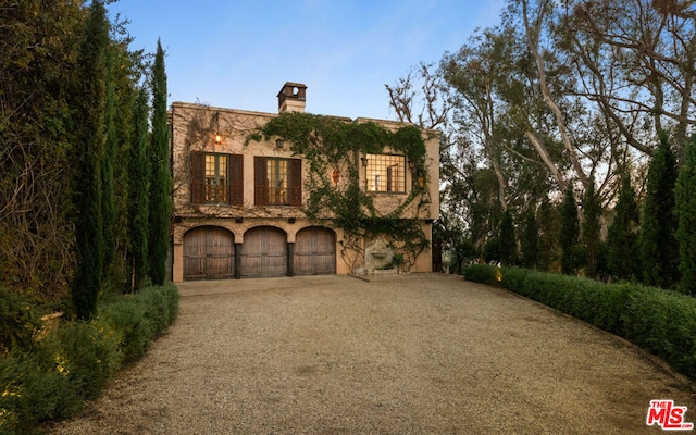 view of front of house with a garage