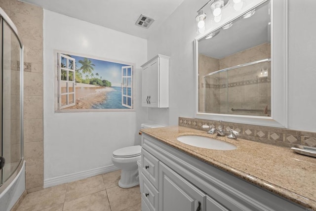 full bathroom with vanity, toilet, combined bath / shower with glass door, and tile patterned flooring