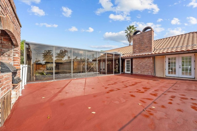 view of patio / terrace featuring french doors and a grill