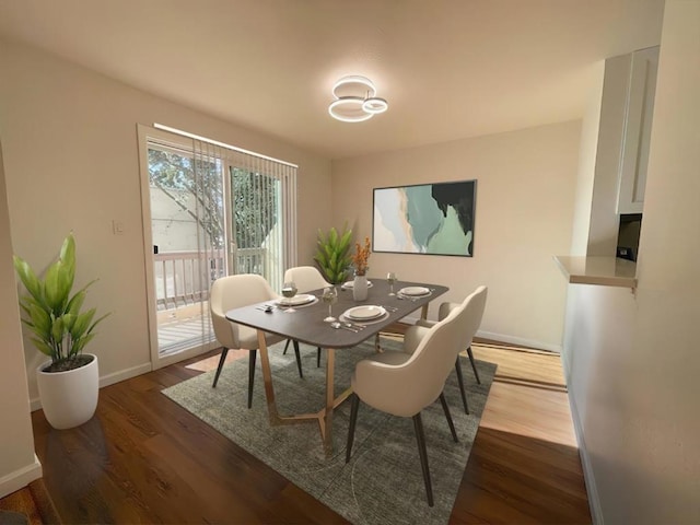 dining area featuring hardwood / wood-style floors