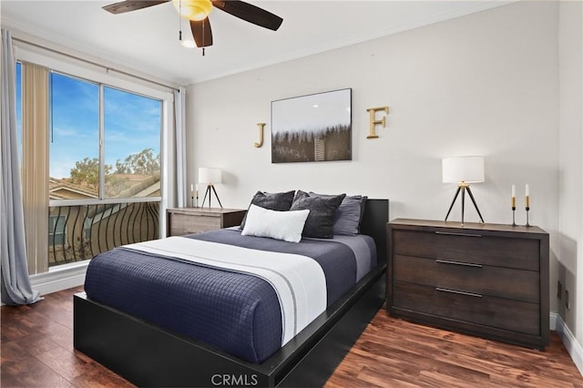 bedroom featuring dark hardwood / wood-style floors and ceiling fan