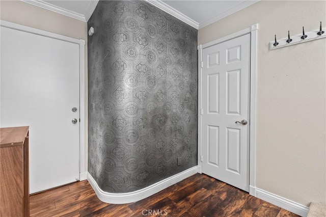 interior space with dark hardwood / wood-style flooring and ornamental molding