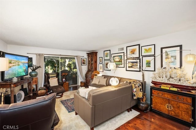 living room featuring dark hardwood / wood-style floors