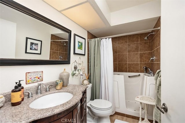 bathroom featuring vanity, toilet, and a shower with shower curtain