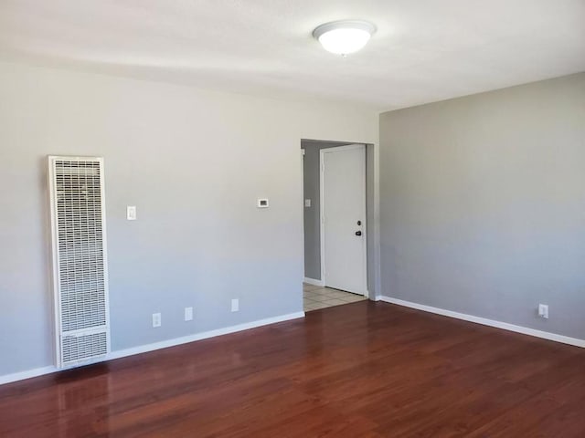 unfurnished room featuring hardwood / wood-style floors