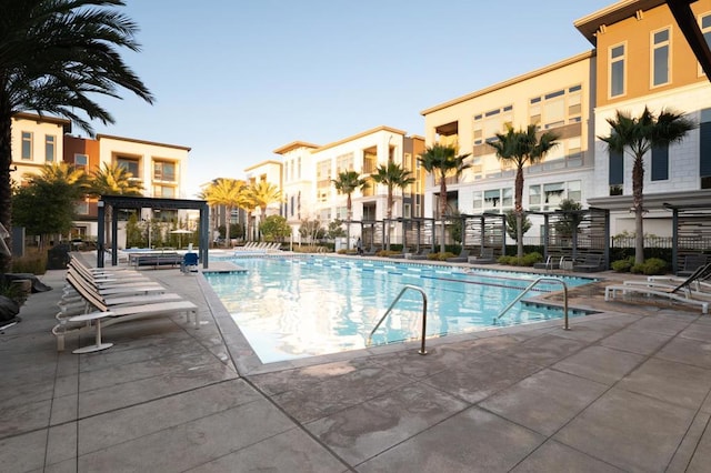 view of swimming pool featuring a patio