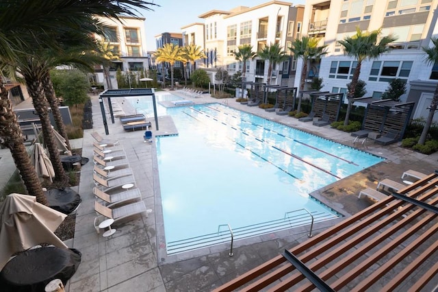 view of pool featuring a patio