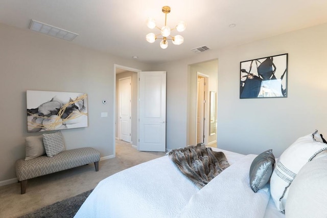 carpeted bedroom with an inviting chandelier