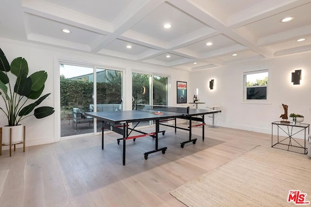 game room featuring coffered ceiling, ornamental molding, beam ceiling, and light wood-type flooring