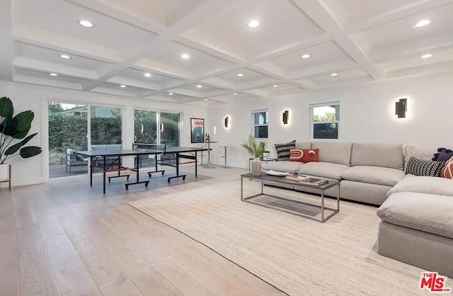 living room with coffered ceiling, beam ceiling, and light wood-type flooring