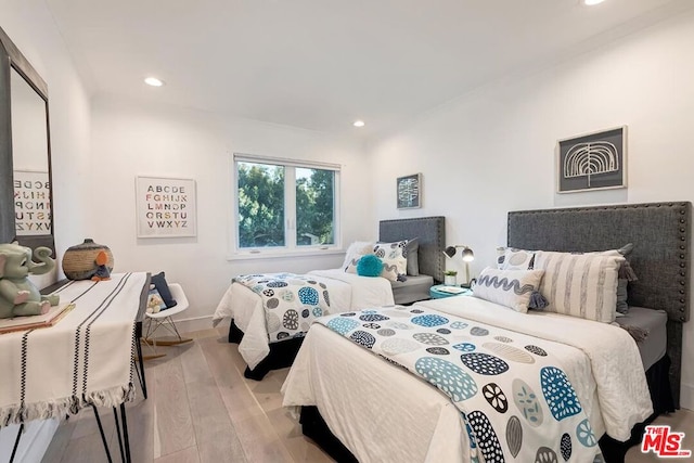 bedroom with light wood-type flooring