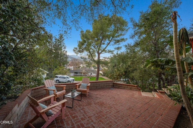 view of patio featuring a mountain view