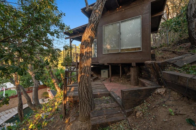 view of side of home featuring a patio