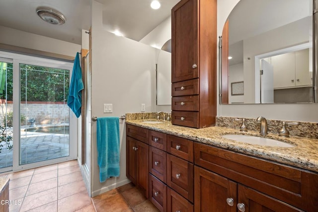 bathroom with vanity and tile patterned floors