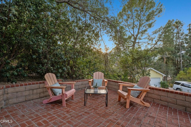 view of patio / terrace with a garage