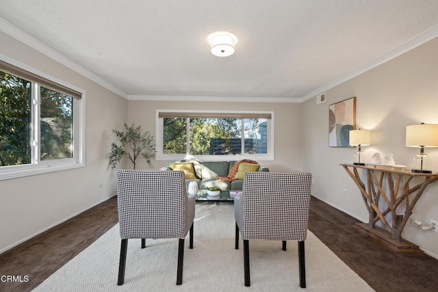 carpeted dining area with crown molding