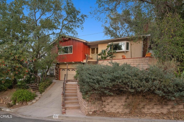 view of front of home with a garage