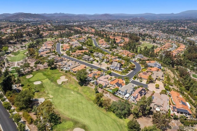 birds eye view of property featuring a mountain view