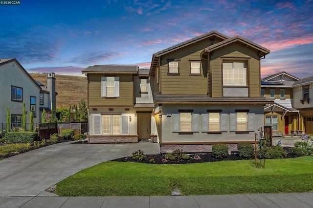 view of front of home featuring a yard