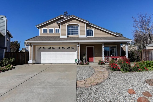 view of front facade featuring a porch and a garage