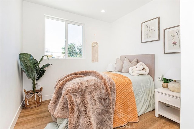 bedroom featuring light hardwood / wood-style flooring