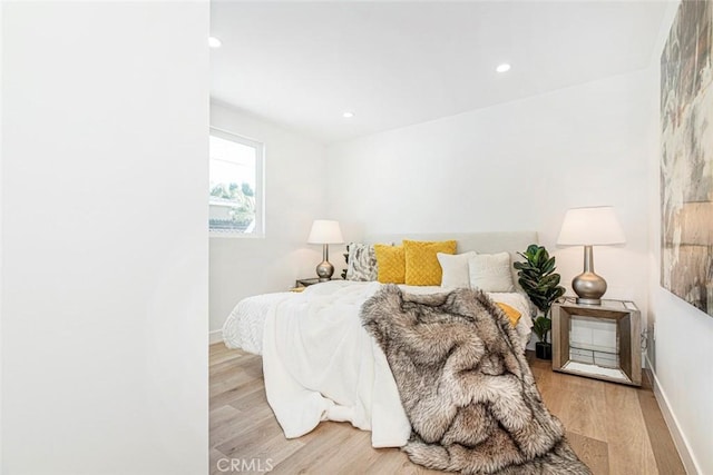 bedroom featuring light wood-type flooring