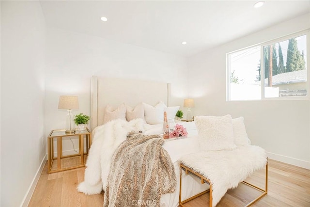 bedroom featuring light hardwood / wood-style floors