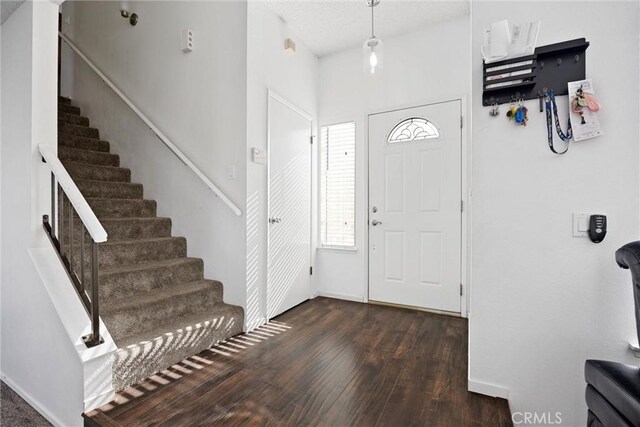 foyer featuring dark hardwood / wood-style floors