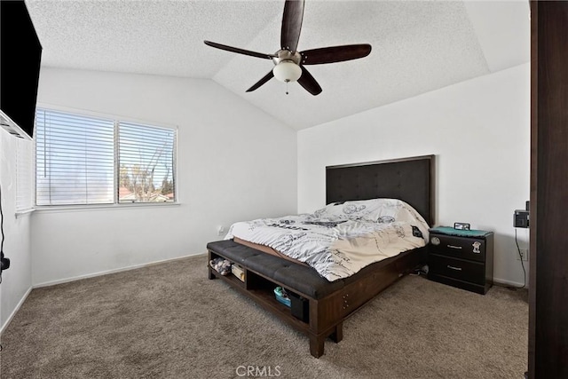 bedroom featuring ceiling fan, a textured ceiling, carpet, and vaulted ceiling