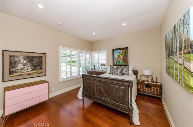 bedroom featuring dark hardwood / wood-style floors