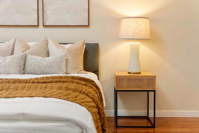 bedroom with hardwood / wood-style flooring