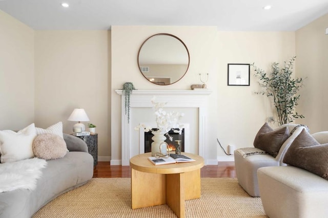 living room with light hardwood / wood-style flooring