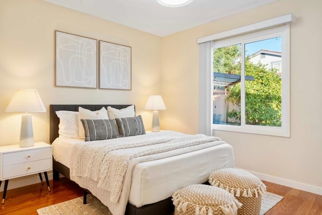 bedroom featuring wood-type flooring