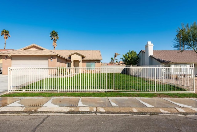 ranch-style house with a garage and a front lawn