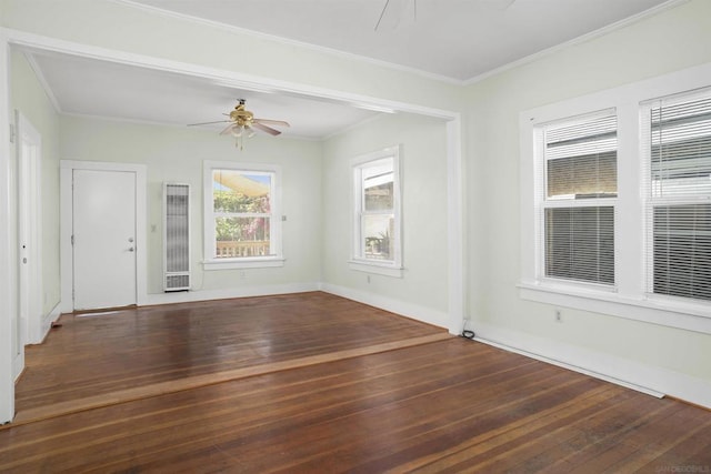 unfurnished room with ceiling fan, dark hardwood / wood-style floors, and ornamental molding