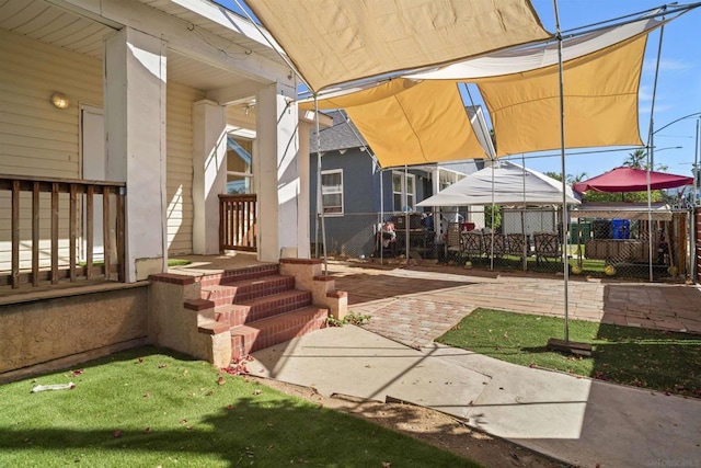 property entrance with a patio area