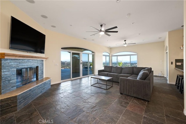 living room featuring ceiling fan