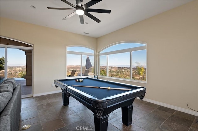 game room with ceiling fan and billiards