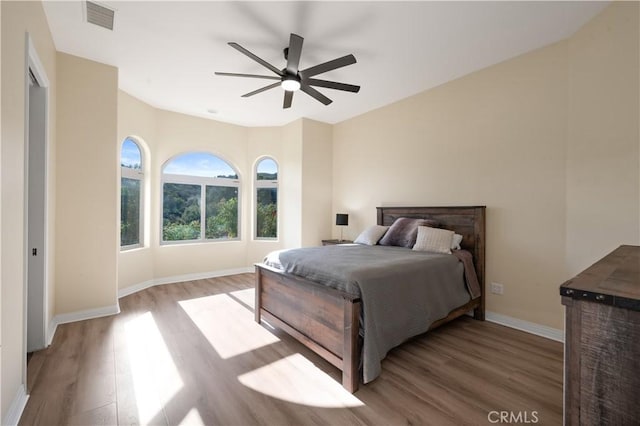 bedroom featuring ceiling fan and hardwood / wood-style floors