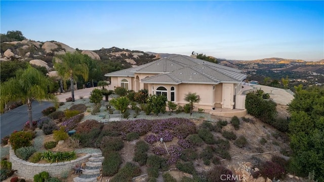 exterior space featuring a mountain view